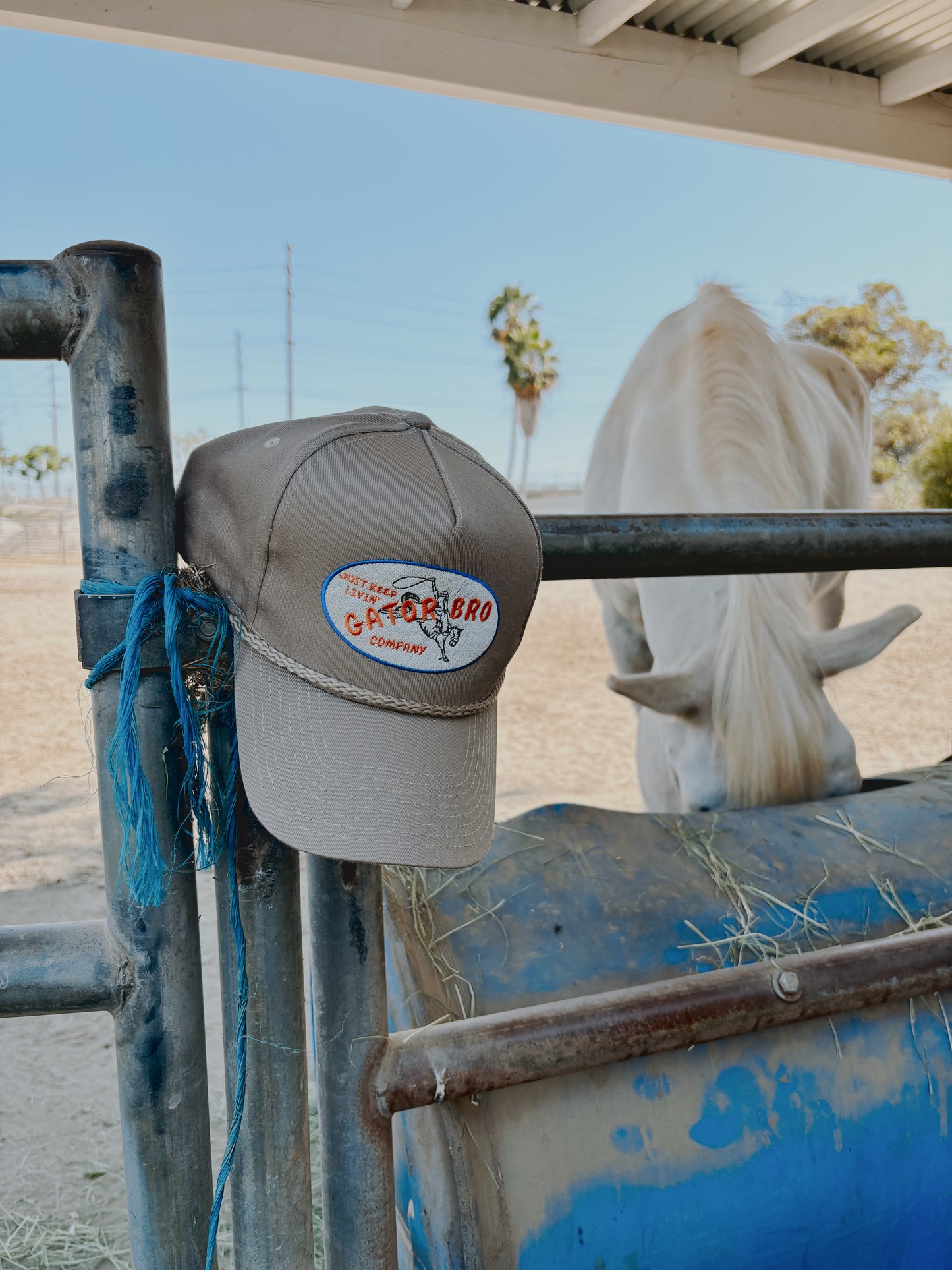 JUST KEEP LIVIN’ Khaki Trucker Hat